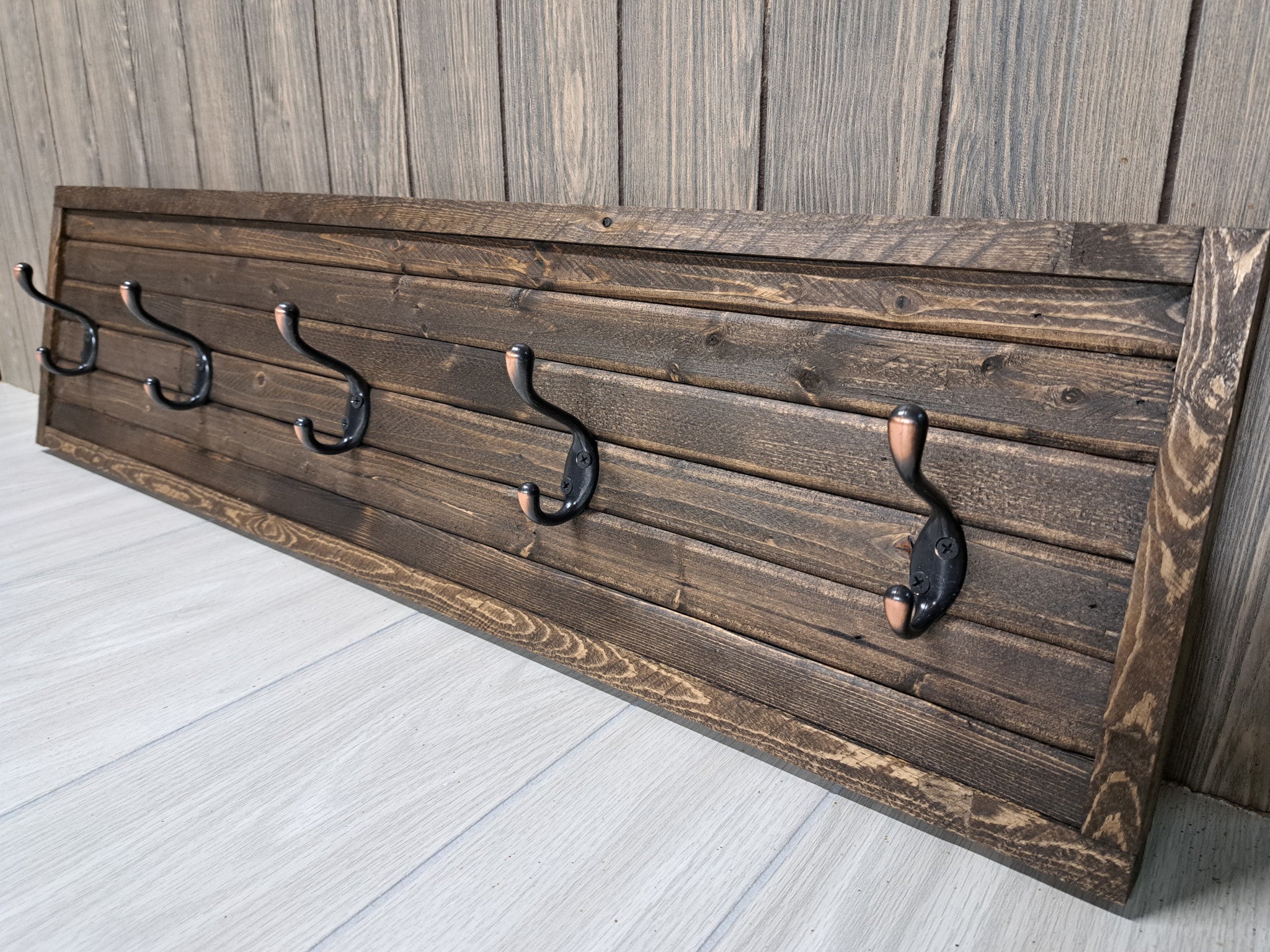 Dark wood coat deals rack